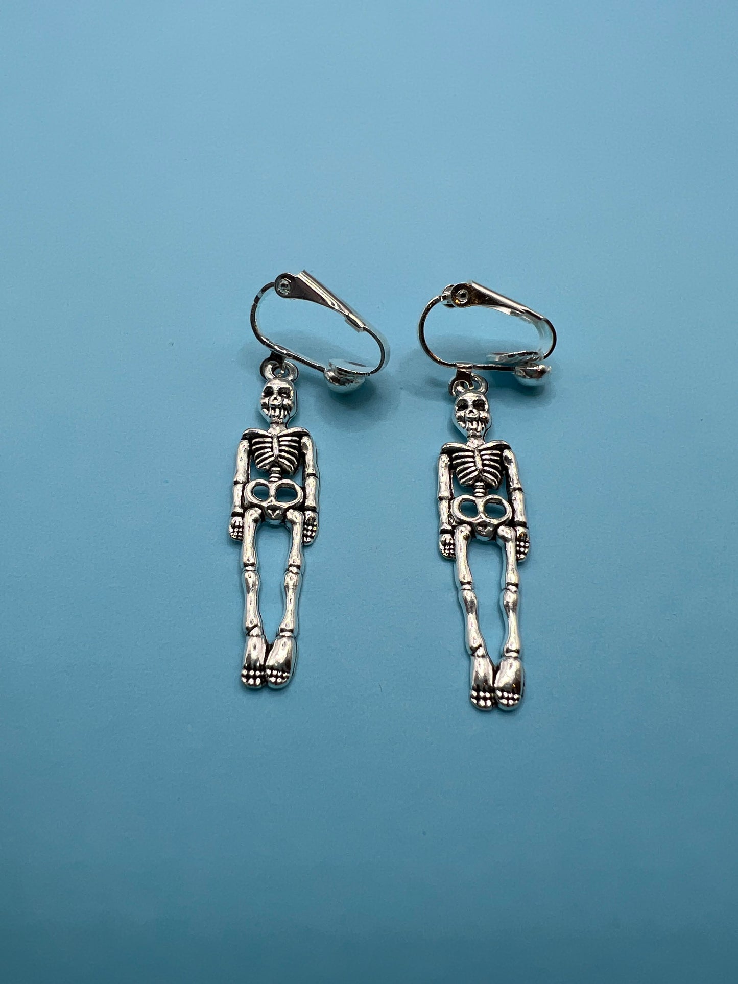 Skeleton Clip On Earrings