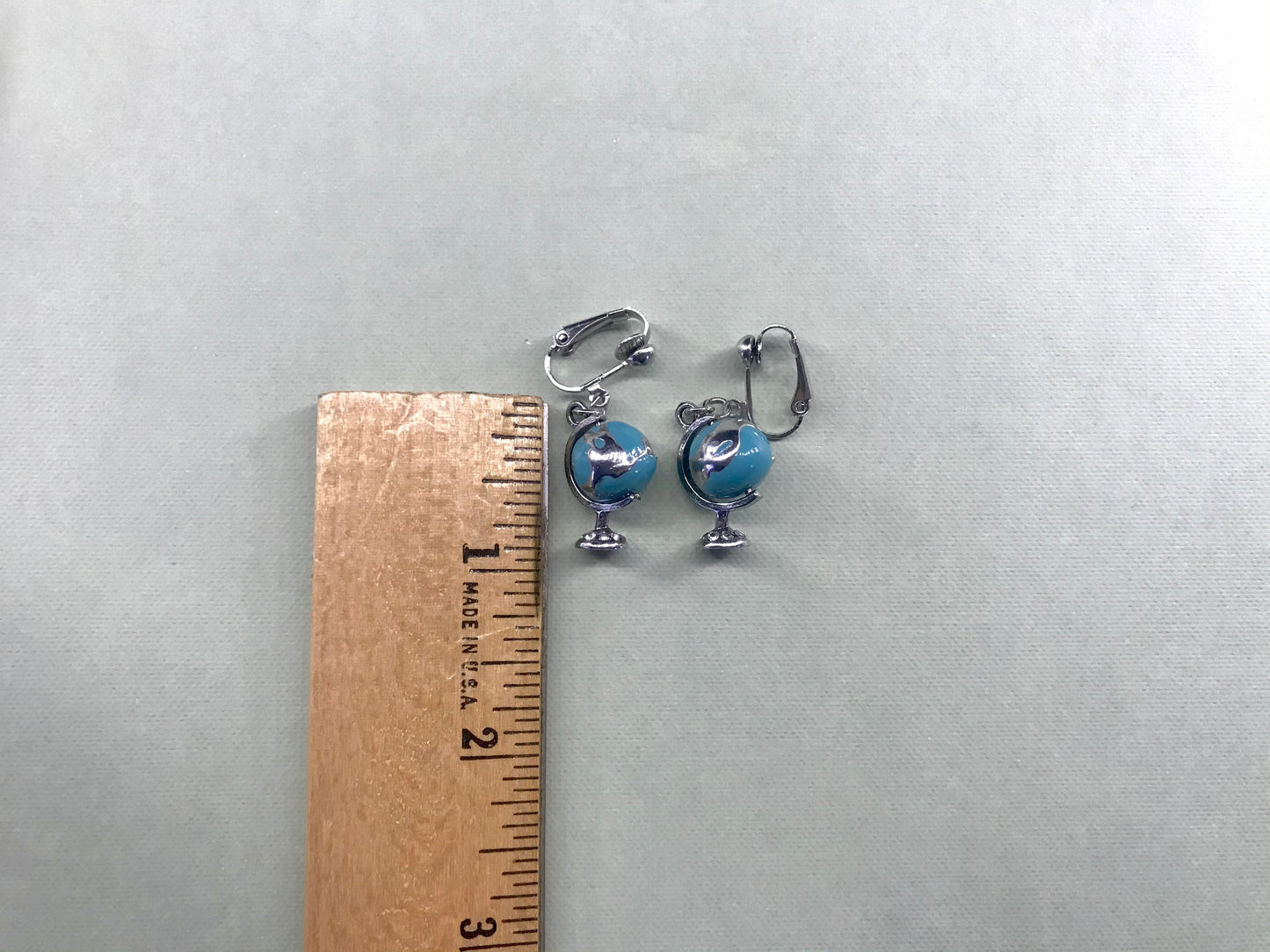 Globe Spinning Clip On Earrings